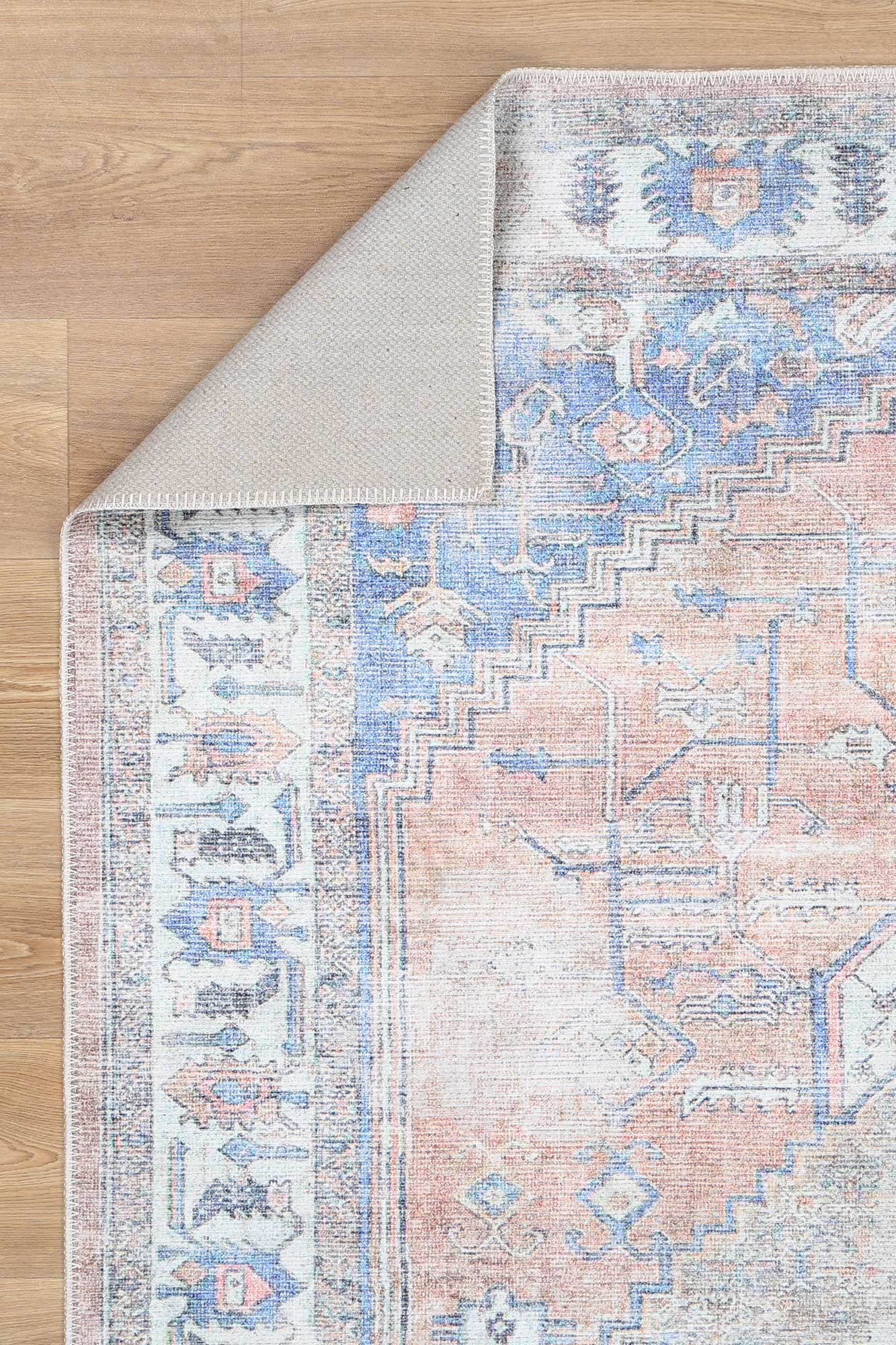 Kowhai Pissarro Terracotta Blue Machine Washable Rug